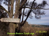 Possum Busters Sign