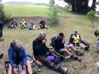 Panorama of some of the 26 hikers lunching.