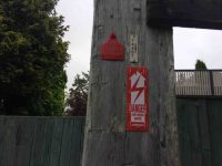 Red ticketed power pole. (Ian pic and caption.)