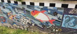 Mosaic wall with images of sea creatures