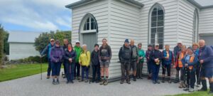 Pukehiki Church is the background for our group photo. Caption and photo Helen