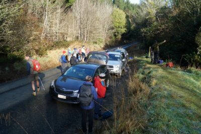 14 Aug Whare Flat Trampers Graham Pointing Out Where We're Going At A Chilly Morning Start. Caption & Photo John