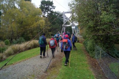 Five People At A Time On The Suspension Bridge. Caption And Photo John