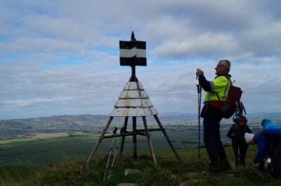 Is neil taking a photo of the trig caption and photo john