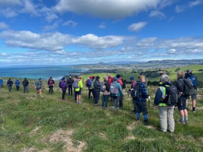 29 oct kareti track hikers a brief stop on karetai track looking back over dunedin. photo & caption pam