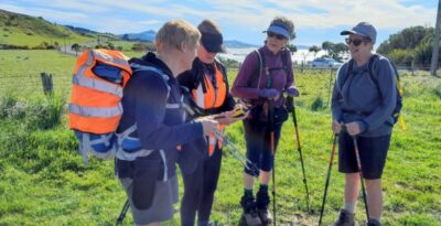 8 oct daphne road trampers lyn and sylvie demonstrating the new walkie talkies photo & caption jane