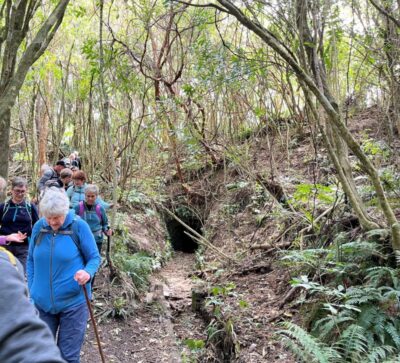 8 oct racemans hikers passing a water race tunnel. photo & caption sandra
