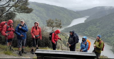 About to leave the taieri viewpoint – smiles as we realise the rain has stopped! jane