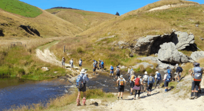 4 feb scorgies farm hikers and trampers crossing broad stream. the lucky people got wet feet to cool them down during the climb…photo & caption jane.jpg