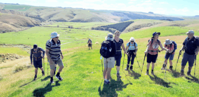 4 feb scorgies farm hikers and trampers first hill, phew we walked past the lee stream motocross course, visible in the paddock behind. photo & caption jane.jpg