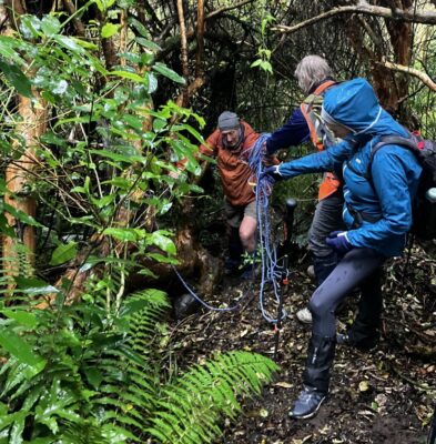 Martin securing a rope for our slippery descent! jill r