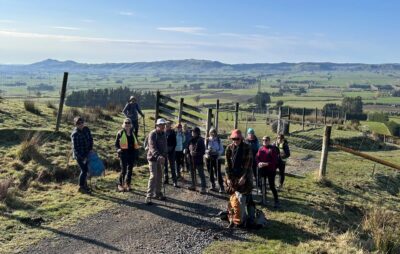 Setting off with Saddle Hill in background Caption and photo Jenni