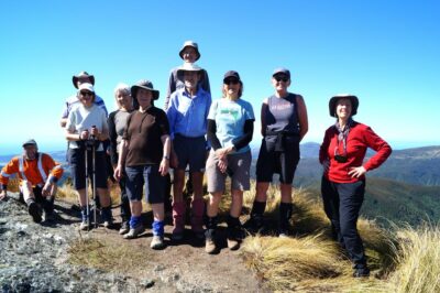 Happy trampers on Pulpit Rock. Caption and photo John